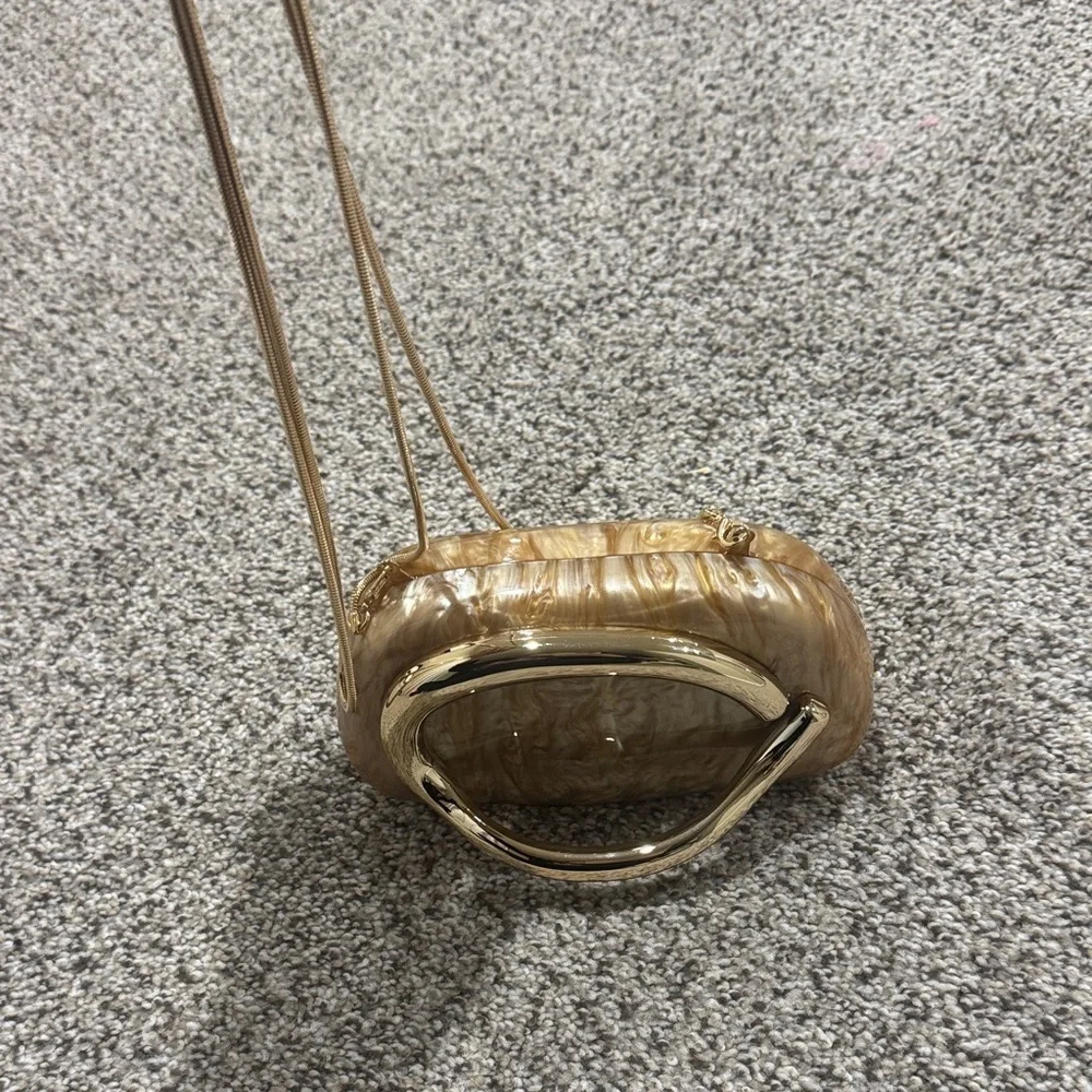 Gold clutch purse